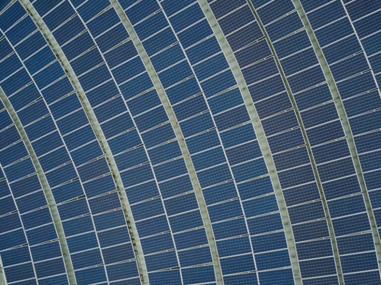 Solar Cooling - blue solar panel lot