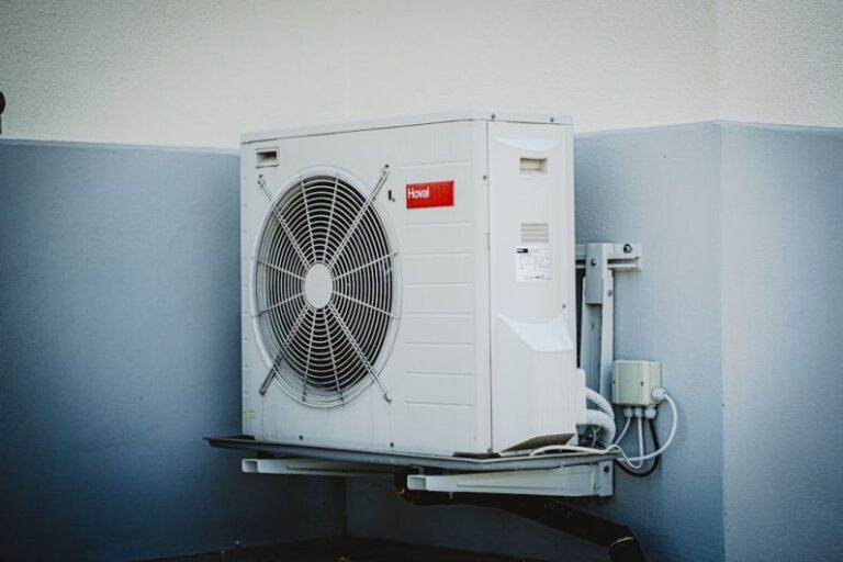 Air Conditioner - white and gray box fan