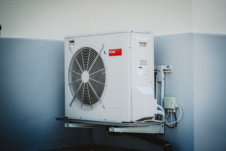 Air Conditioner - white and gray box fan