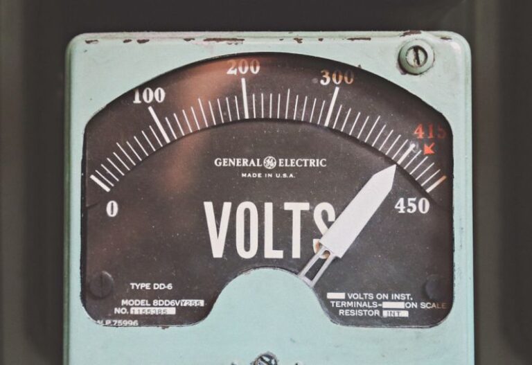 Energy Consumption - gray GE volt meter at 414