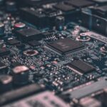 Technologies - macro photography of black circuit board