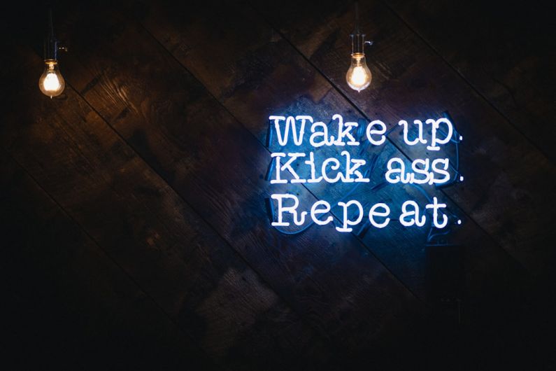 Innovations - blue wake up kick ass repeat neon sign