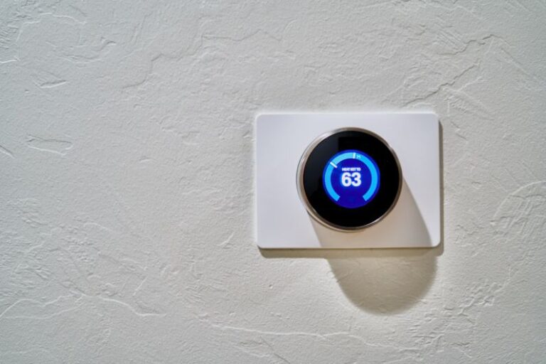 Smart Thermostats - white thermostat at 62